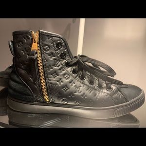 Louis Vuitton high top sneakers .